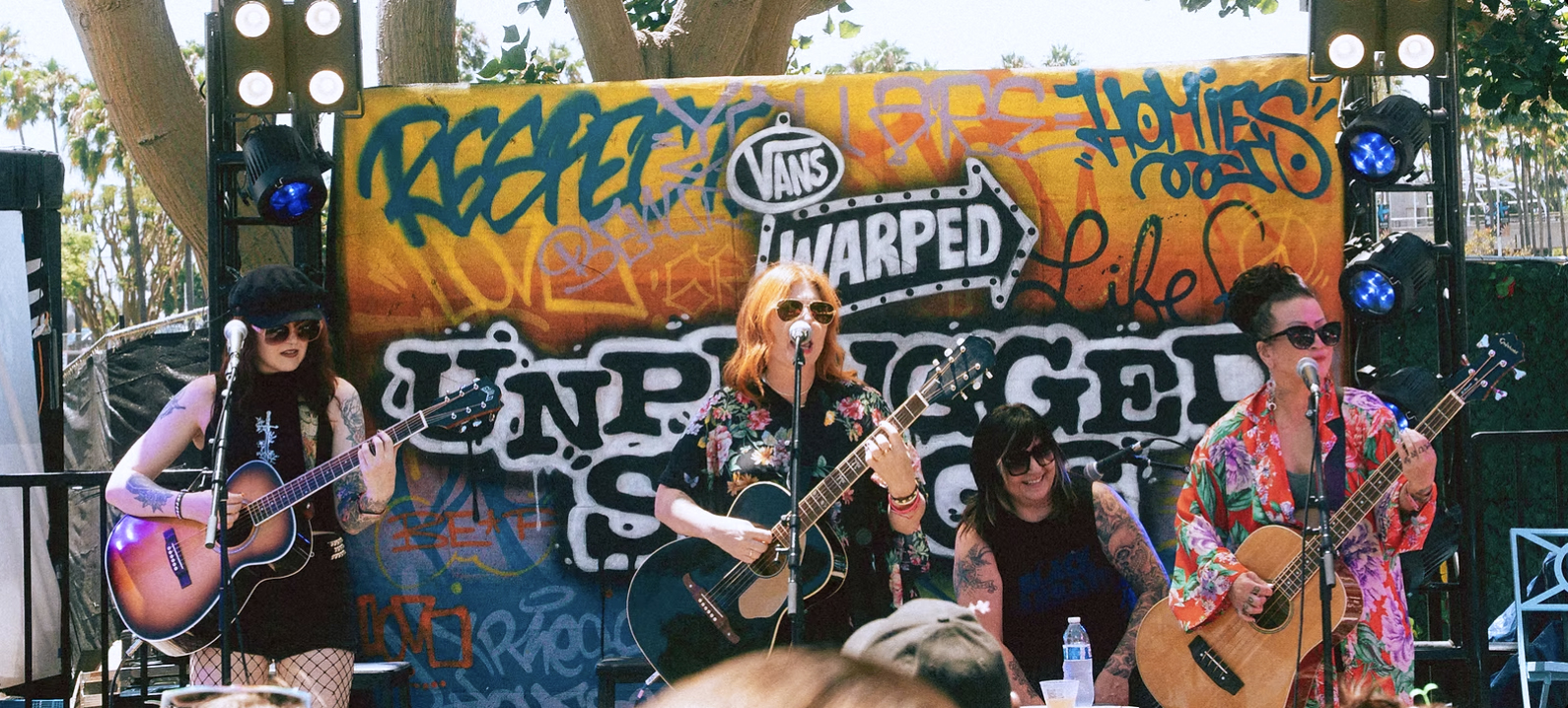 A band performs onstage at Vans Warped Tour.